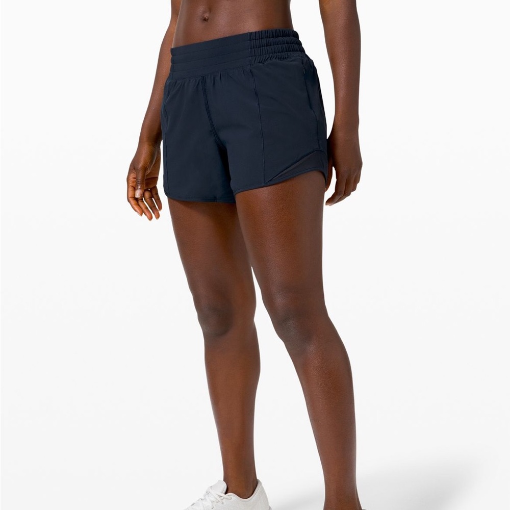 Lululemon Hotty Hot high rise 4” Size 6 True Navy